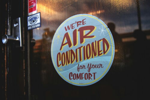 Sign open for air conditioned